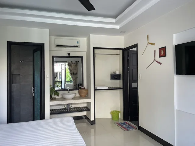 غرفة ديلوكس بسرير كينج بشرفة، Starfruit Homestay Hoi An 5/10