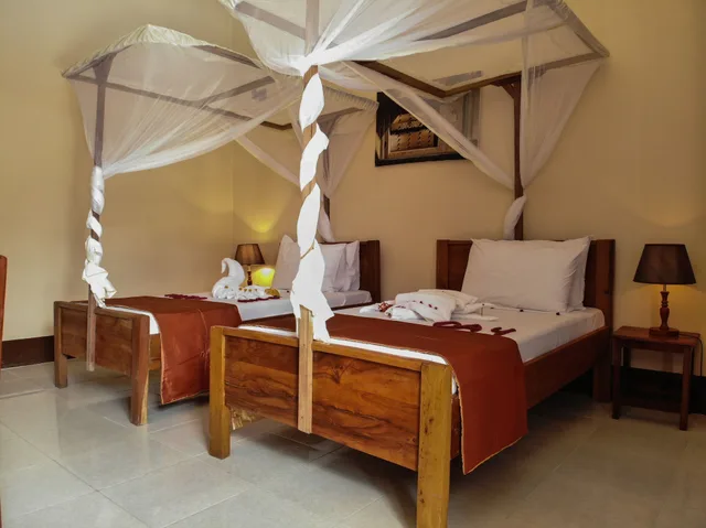 غرفة قياسية بسريرين منفصلين، Amaan Beach Bungalows 1/2