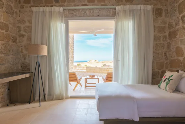 غرفة قياسية بسريرين منفصلين بإطلالة على البحر، Wadi Sabarah Lodge 4/6