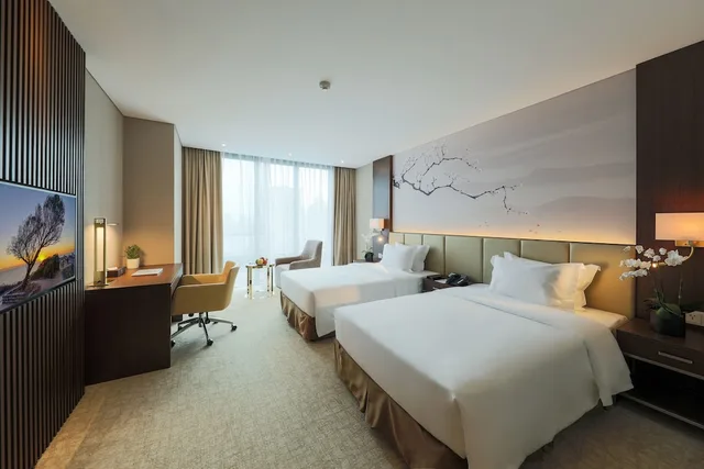 غرفة تنفيذية بسريرين منفصلين، Grand Vista Hanoi 1/4