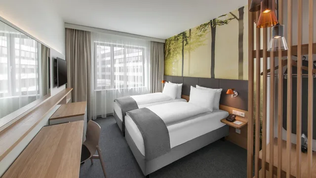 غرفة قياسية بسرير فردي بإطلالة على الفناء، Holiday Inn Munich Leuchtenbergring, an IHG Hotel 5/9