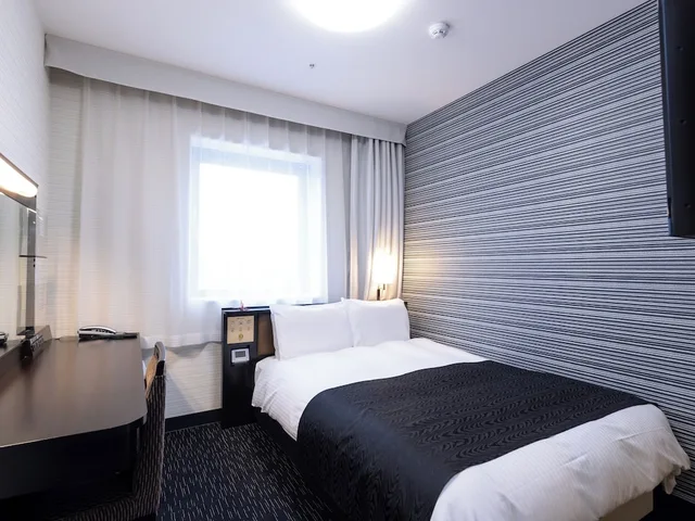 غرفة بسرير مزدوج في الطابق العلوي، Apa Hotel Tsuruoka-Ekimae 1/4