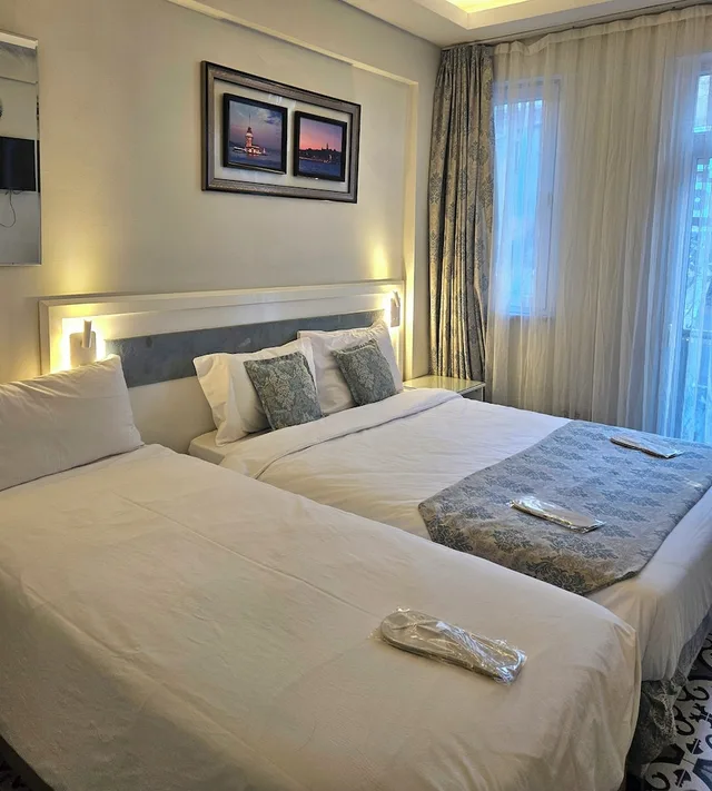 غرفة سوبيريور ثلاثية بسرير مزدوج وسرير فردي، Lemon Residence 3/8