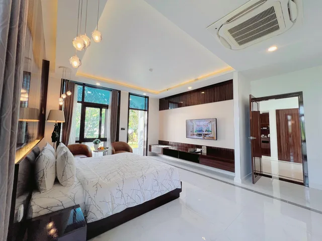 جناح عائلي بسرير كينج وسريرين منفصلين بإطلالة على البحر، Carmelina Beach Resort 1/4