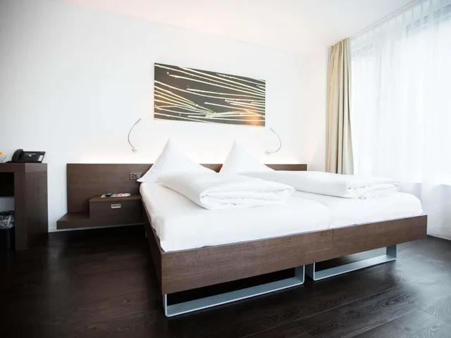 غرفة قياسية بسريرين منفصلين بإطلالة على الجبل، Mercure Chur City West 3/9