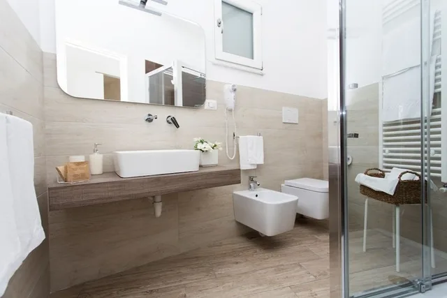 غرفة ديلوكس بسرير كوين وسرير فردي، Residence Le Vie Del Centro 5/7