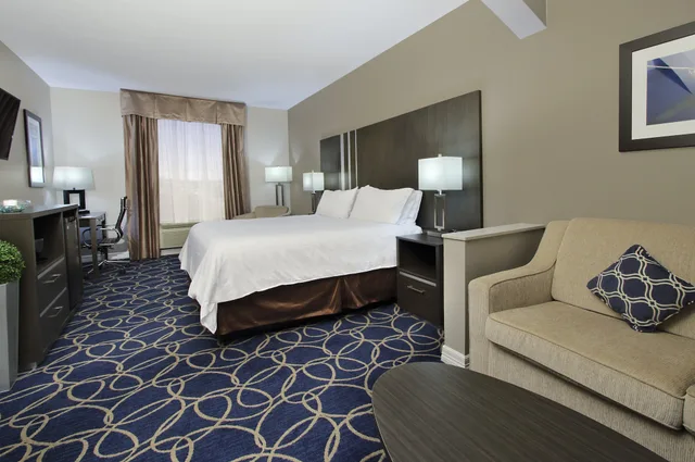 جناح بسرير كينج بمنطقة جلوس، Holiday Inn Express Suites Houston North Iah Area 1/5