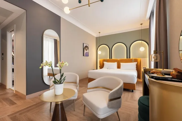 غرفة جونيور بفراش فوتون وسرير كينج وسرير فردي، Je Rome Hotel 2/4