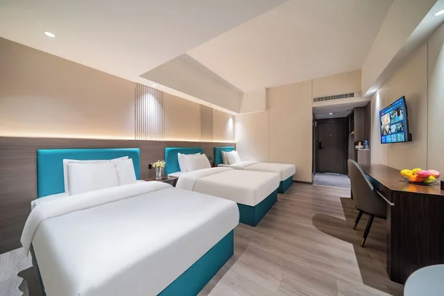 غرفة إليت ثلاثية بثلاثة أسرّة، Guangzhou Meigang Hotel 1/3