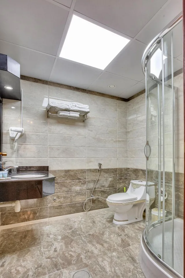 غرفة قياسية ثلاثية، Royal Hotel Sharjah 3/4