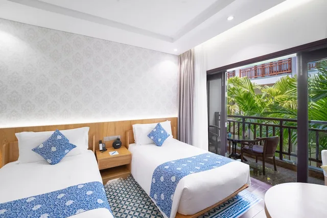 Faifo Twin with Garden View, Wafaifo Resort Hoi An 3/6