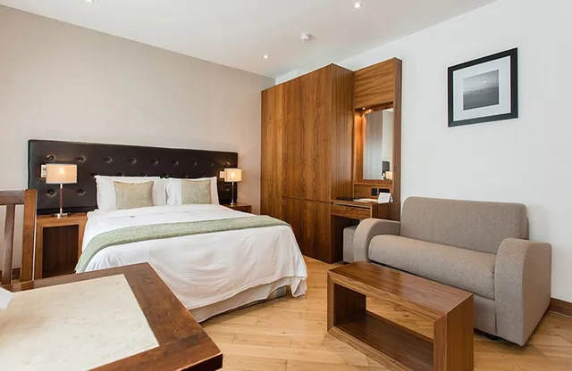 شقة بسرير مزدوج بغرفة نوم واحدة مع أريكة، Presidential Apartments - Kensington 1/7