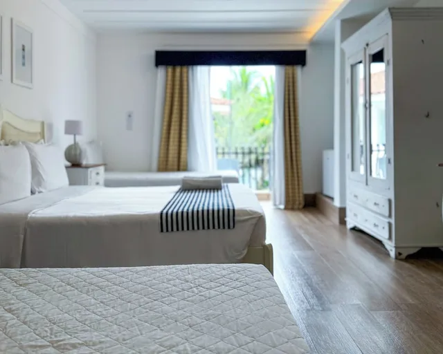 غرفة ديلوكس ثلاثية بسرير كوين وسرير فردي بإطلالة على المسبح، Hotel Boutique Recanto Da Passagem 1/3