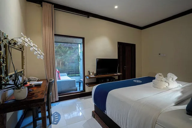 غرفة ديلوكس بسريرين منفصلين بإطلالة على الحديقة، Rama Residence Petitenget Hotel 9/10