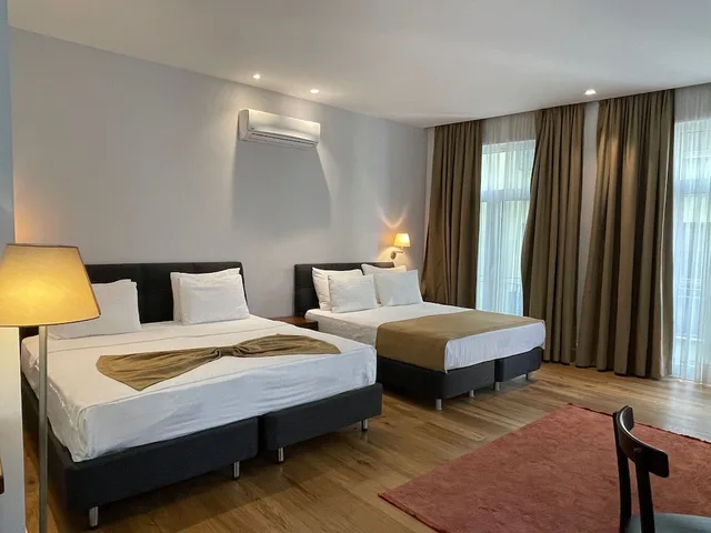 غرفة عائلية بسريرين كوين مع أريكة، Misafir Suites 8 Istanbul. 3/5