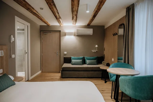 غرفة جونيور بسرير كينج وسرير فردي، Hotel Garni Venezia 6/10