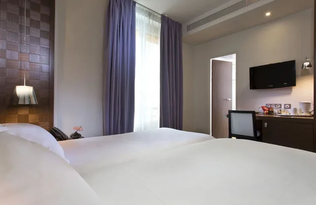 غرفة بسريرين منفصلين، Hotel Le Colisee 3/9