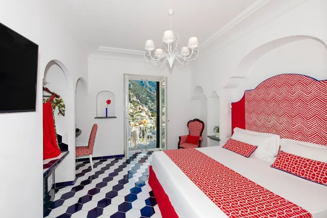 غرفة ديلوكس بسرير مزدوج بإطلالة على البحر، Hotel Reginella Positano 1/3