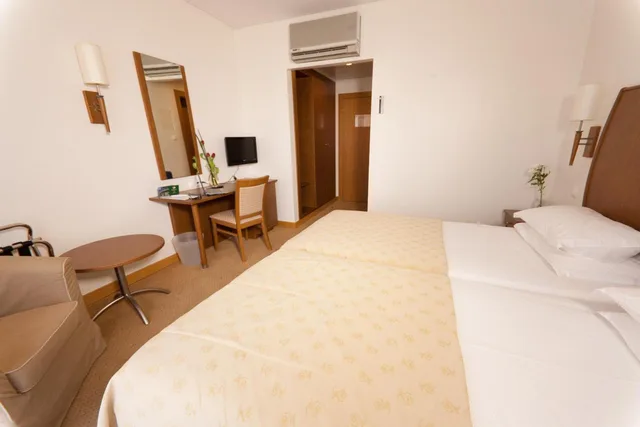 غرفة مفردة، Hotel Cinquentenario & Conference Center 1/12