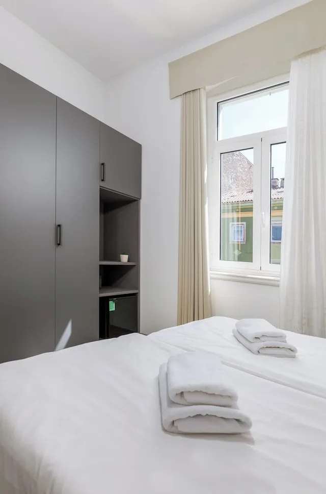غرفة سوبيريور بسرير كوين وسرير فردي، BOUTIQUE HOSTEL JOYCE 1/10