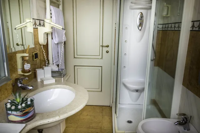 غرفة كلاسيكية عائلية، Hotel La Bussola 4/6