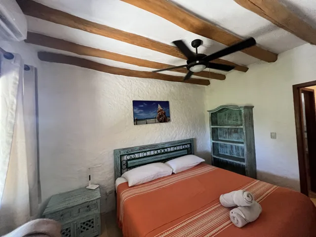 شقة ديلوكس بسريرين مزدوجين بإطلالة على الحديقة بمطبخ صغير، Ensueno Holbox & Beach Club 1/2