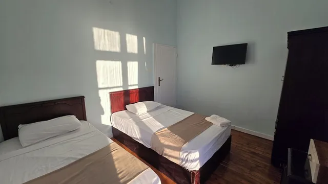 غرفة بسريرين منفصلين بحمام مشترك، Traveler Apos S House Hotel 7/10
