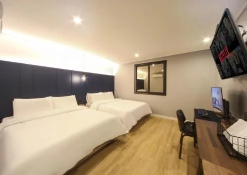 غرفة بزنس بسريرين منفصلين، The Stone Bridge Hotel Sasang 1/4