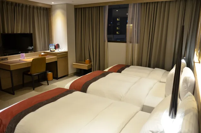 غرفة ديلوكس بثلاثة أسرّة مع سرير إضافي، Green World Hotel Grand Nanjing 6/7