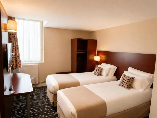 غرفة بسريرين منفصلين، Kyriad Saint Malo Ouest Dinard 1/8