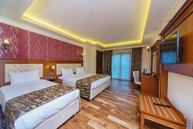 غرفة ديلوكس ثلاثية بسرير مزدوج وسرير فردي، Lausos Palace Hotel Istanbul 1/3