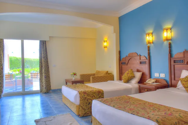 غرفة عائلية بسرير كينج وسريرين منفصلين بإطلالة على الحديقة، Jasmine Palace Resort and Spa 3/10