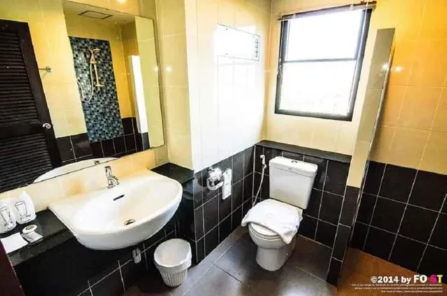 غرفة ثلاثية بسرير كينج وسرير فردي، Aj Residence 9/9