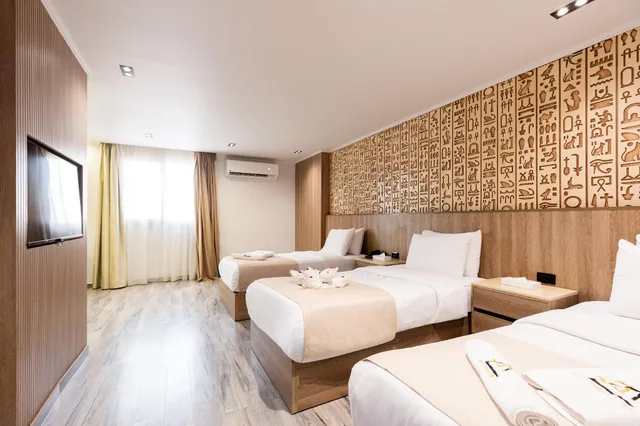 غرفة قياسية ثلاثية بسريرين مزدوجين، Great Pyramid Inn 1/3