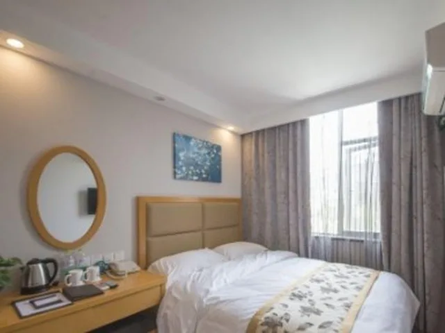 غرفة بسرير كينج وسرير كوين، Greentree Inn Zaozhuang Tengzhou Xueyuan East Road Guiheyuan Hotel 1/1