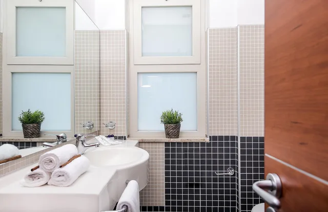 غرفة ثلاثية بسريرين، HOTEL OLIMPICO 2/2