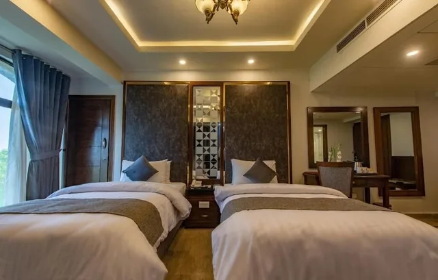غرفة تنفيذية بسريرين منفصلين، ENVOY CONTINENTAL HOTEL 2/5