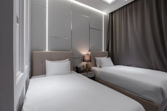 غرفة قياسية بسريرين منفصلين، Europe Hotel Tashkent 1/2