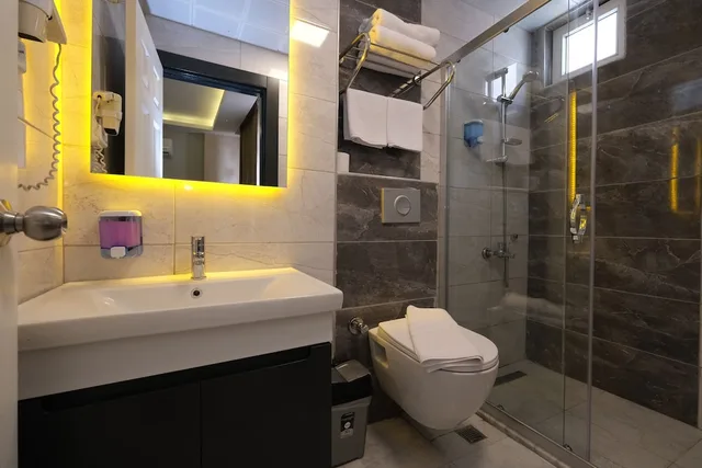 2 Bedrooms, Family, Quadruple, 1 Double and 3 Single Beds، Alanya Risus Park Hotel 3/7