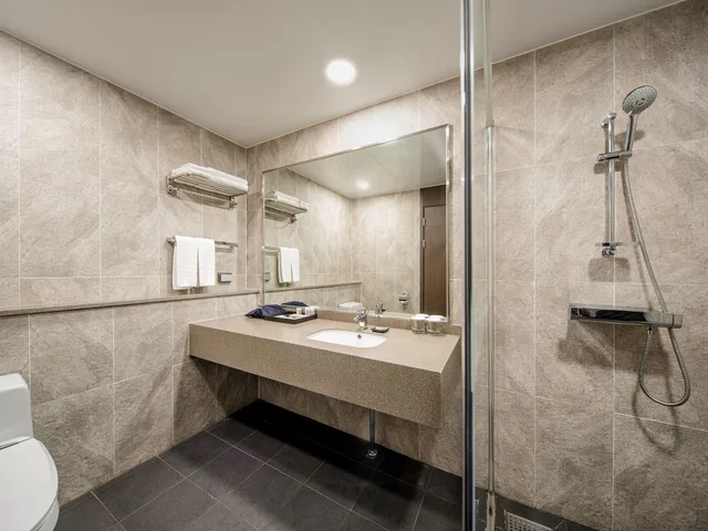 غرفة ديلوكس بسرير كوين بإطلالة جزئية على البحر، Hotel Tops 10 9/10