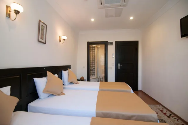 غرفة ثلاثية بإطلالة على الحديقة، SULTANS HOTEL 6/10