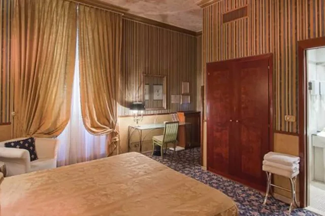 غرفة رباعية بسرير كينج وسريرين منفصلين، Hotel Celio 2/3