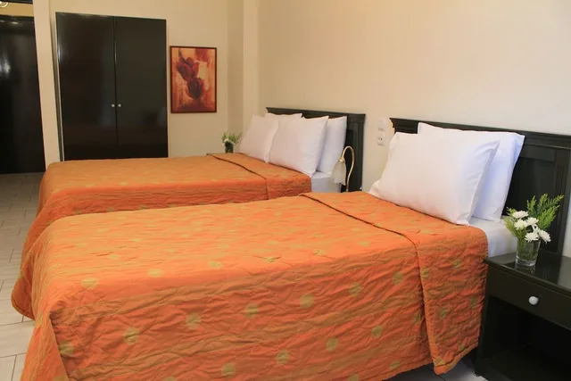 غرفة ثلاثية بثلاثة أسرّة، Famissi Eden Hotel 1/3