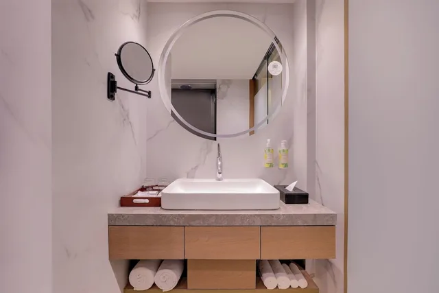 غرفة بريميوم بسرير كوين، Grand Hometel Malad 6/7