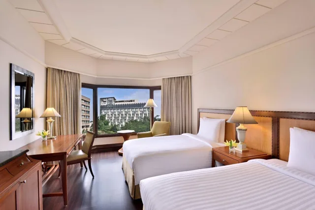 غرفة ديلوكس بسريرين منفصلين بحوض استحمام، Hyderabad Marriott Hotel And Convention Centre 1/6