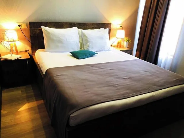 غرفة كبيرة بسرير بطابقين وسرير كوين، Nabadi Hotel 2/3