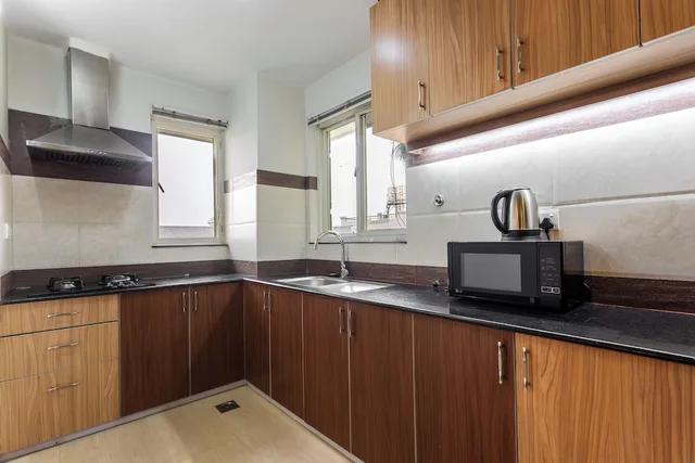 شقة بسرير كوين بحوض استحمام، Suite Homes 9/9