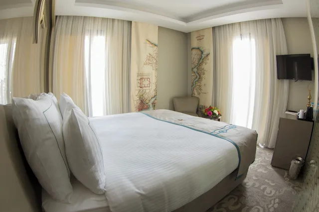 غرفة ديلوكس ركنية بسريرين منفصلين بشرفة، PEYK HOTEL 1/8