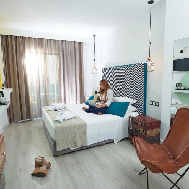 غرفة ديلوكس مفردة بشرفة، Blue Bottle Hotel 1/10