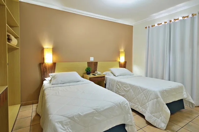 Deluxe, Twin Beds, Street View، Plaza Inn Flat Araxa 1/4